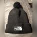 The North Face Accessories | Black The North Face Beanie With Black Fuzzy Ball On Top. One Size. Unisex | Color: Black | Size: Os