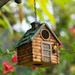 kosheko Outdoor Decorative Resin Bird House Hanging Birdhouse with Metal Ring for Garden Patio Yard Brown