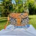 Coach Bags | Coach Bleeker Vachetta Leather And Signature Denim Floral Applique Wristlet Rare | Color: Blue/Tan | Size: Os