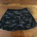 Athleta Other | Athleta Match Point Camo Printed Skort 13.5" Size Xs Tennis Skirt Shorts Black | Color: Black/Gray | Size: Os