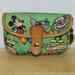 Dooney & Bourke Bags | Disney Dooney & Bourke Cartoon Sketch Snap Green Pouch Bag | Color: Green/Tan | Size: Os