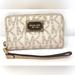 Michael Kors Bags | Michael Kors Ivory Monogram Signature Coated Canvas Zip Around Wristlet | Color: Brown/Cream | Size: Os