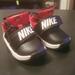 Nike Shoes | Nike Kids Baby Boy Team Shoes Size 5c | Color: Black/Red | Size: 5bb
