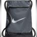 Nike Bags | Nike Brasilia Drawstring Backpack Zipper Pocket And Reinforced Bottom | Color: Gray | Size: Os