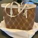 Dooney & Bourke Bags | Brand New Dooney And Bourke Nautical Knot Print East/West Bucket Bag | Color: Brown/White | Size: Os