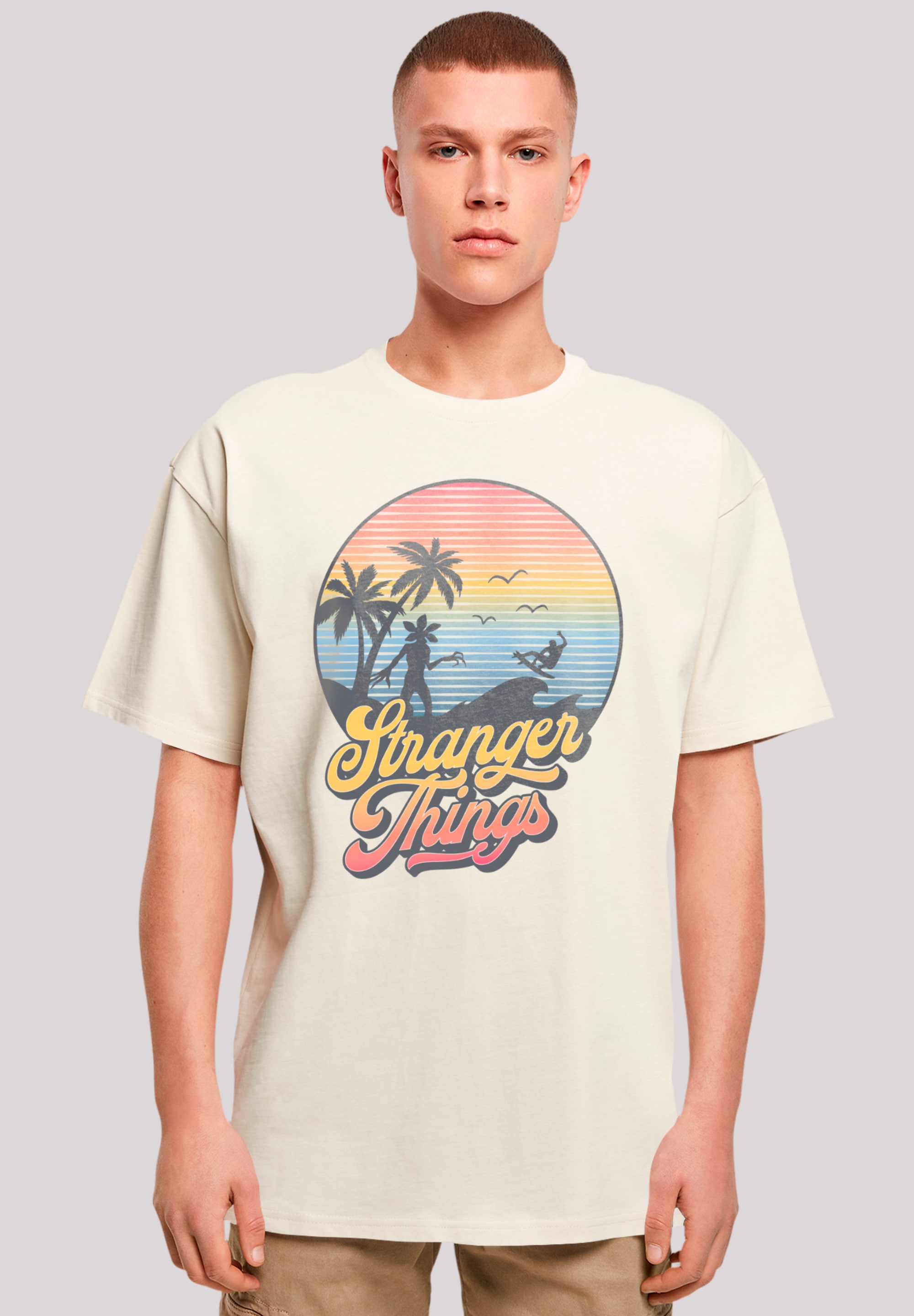 T-Shirt F4NT4STIC "Stranger Things LA Gradient", Herren, Gr. 5XL, beige (sand), Obermaterial: 100% Baumwolle, oversize, Rundhals, ohne Bündchen, Shirts, Premium Qualität Image