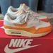 Nike Shoes | Nike Womens Air Max 1 Light Bone Magma Orange Neutral Grey Size 7 Woman's | Color: Gray/Orange | Size: 7