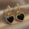 Boucles d'oreilles pendantes coeur biscuits pour femme boucles d'oreilles coeur noir fouet simple