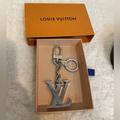 Louis Vuitton Accessories | Louis Vuitton Lv Initials Key Holder And Bag Charm | Color: Silver | Size: Os