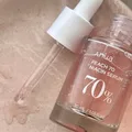 Anua Peach 70-Sérum pour le visage à la nicotinamide essence qui décolore les ridules essence