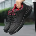 Scarpe sportive da uomo in pelle scarpe da corsa nere Sneakers impermeabili da esterno uomo Big Size