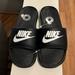 Nike Shoes | Brand New “Nike “Unisex Slippers.Men’s Size-9,Ladies-11. | Color: Black | Size: M-9,W-11
