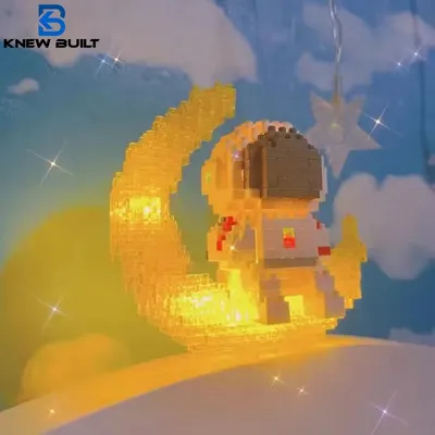 Knew built Luminous Astronaut Moon Micro brick Building Blocks Set Educational Toys LED Light