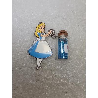 Disney Car Audio, Video & GPS | Disney Parks Alice In Wonderland Drink Me Blue Glitter Potion Cork Bottle Pin | Color: Blue | Size: Os