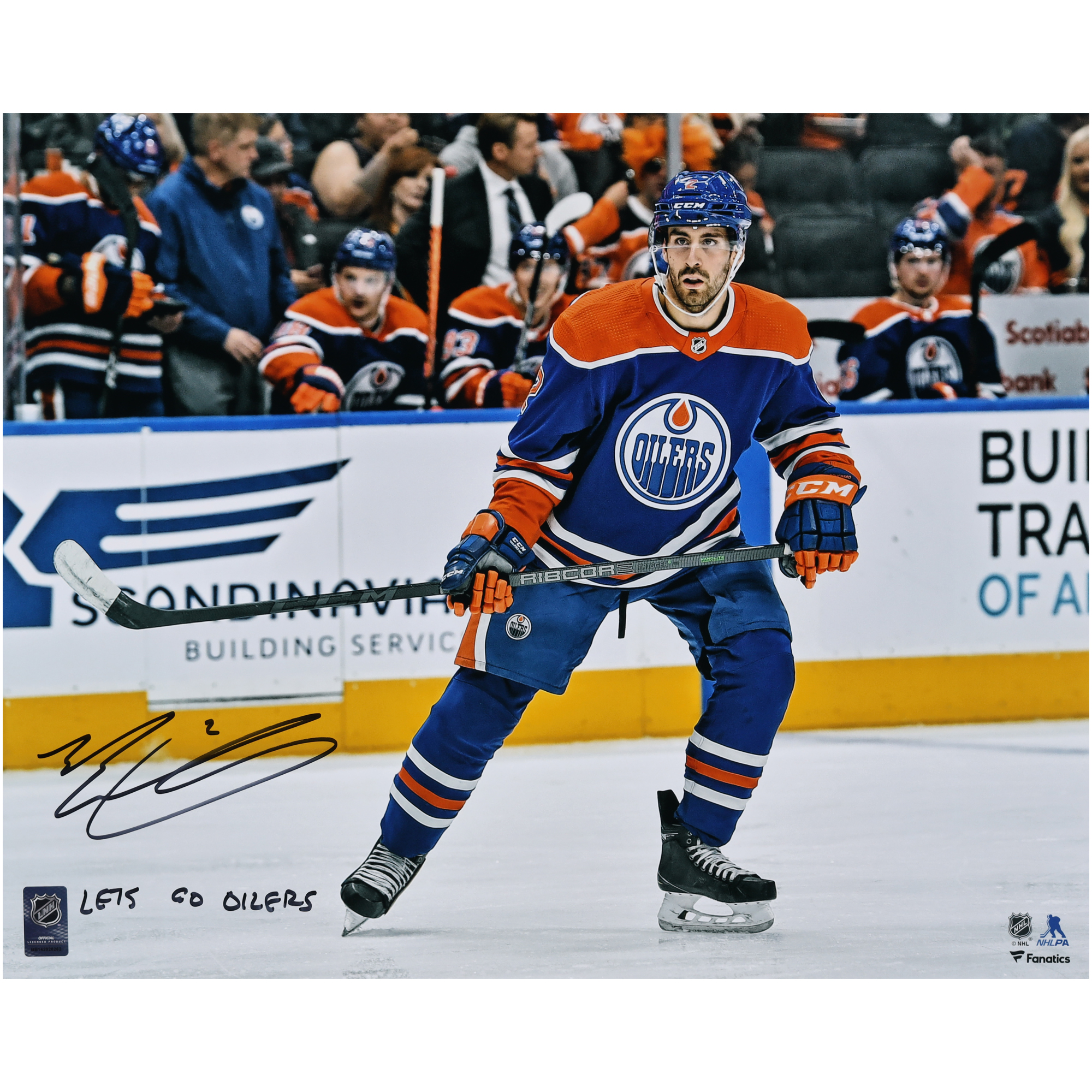 Von Evan Bouchard signiertes 16 x 20 Zoll großes Eiskunstlauffoto der Edmonton Oilers, blaues Trikot mit der Aufschrift „Lets Go Oilers!“ Image