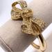 J. Crew Jewelry | J. Crew Jeweled Bow Gold Hinged Bangle Bracelet | Color: Gold | Size: Os