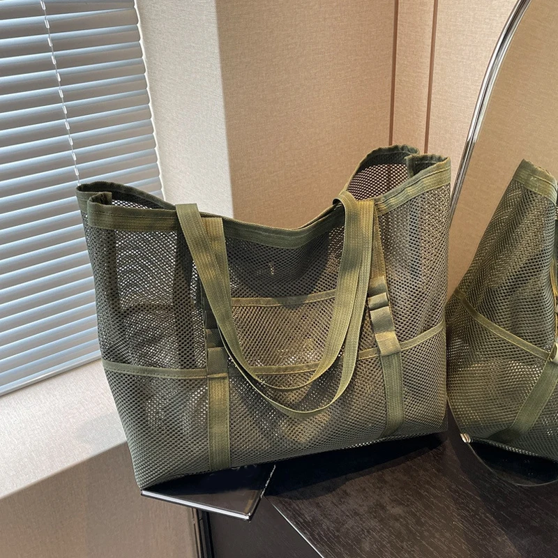 Borsa portaoggetti per trucco cava di grande capacità Borsa a tracolla multifunzionale in rete da donna Borsa da viaggio trasparente Borse da spiaggia