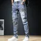 2023 moda uomo Jeans autunno Patch azzurro tendenza pantaloni larghi elastico Streetwear fidanzato