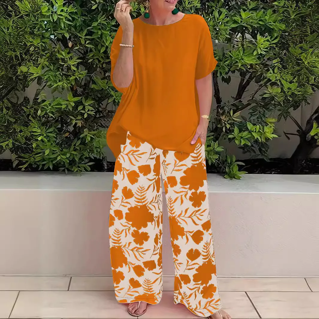 2024 Pantaloni a gamba larga Set a due pezzi Camicia a maniche corte e pantaloni moda donna Set estivo casual allentato Set da 2 pezzi Completo da donna