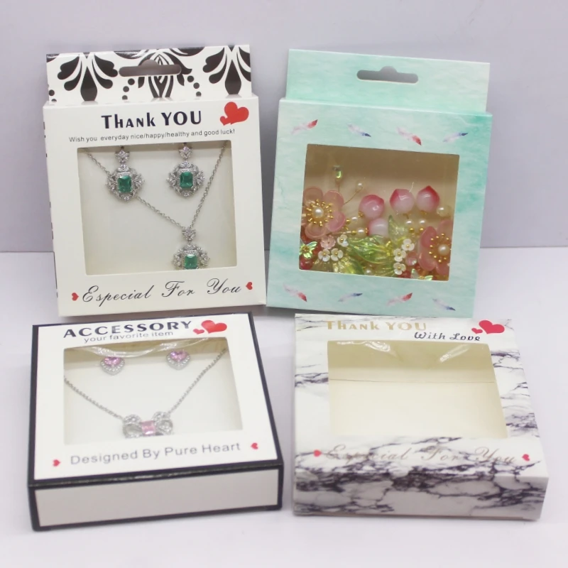 10 Stück 12,5 x 10 x 2,5 cm DIY Hochzeit Süßigkeiten Geschenkbox mit klarem Fenster Hängeloch Verpackungsboxen Partygeschenke Aufhänger Fenster Box Paket Image