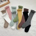 Calzini alti al ginocchio per bambini con volant Neonate Bambini Calzini lunghi in morbido cotone Fiore di pizzo Calzini uniformi scolastiche per bambini per 0-8 anni