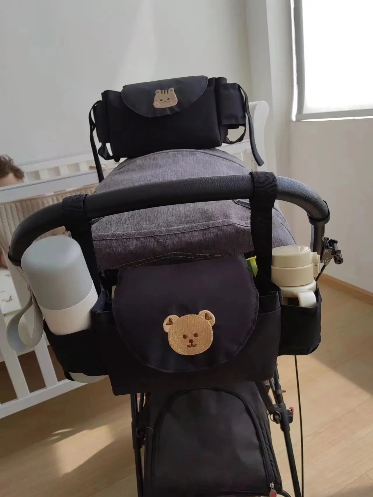 Eine Mama-Tasche, Aufbewahrungstasche für Kinderwagen, magische Tasche Image