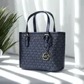 Michael Kors Ole Jet Set da viaggio ultra piccolo con stampa in PVC e borsa tote a tracolla da donna in pelle