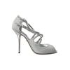 Glanzende silberne Sandalen mit hohen Absatzen