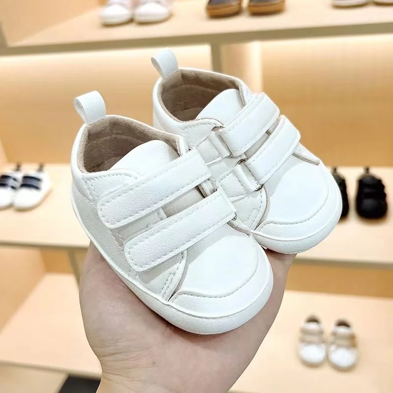 Babyschuhe Frühling und Herbst 0–1 Jahre alt, weiche Sohle, rutschfeste Lernschuhe, modische und vielseitige weiße Wanderschuhe