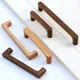 Maniglia per armadio in legno nordico Maniglia per porta da cucina in legno massello Manopole per guardaroba Maniglie per mobili per cassetti dell'armadio