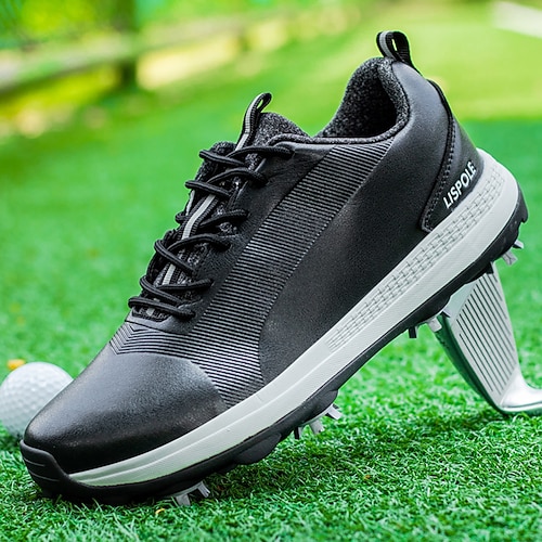 schwarz-weiße Golfschuhe für Herren mit Spikesohle, atmungsaktivem Obermaterial und leichtem Design für Komfort und Halt auf dem Golfplatz Image