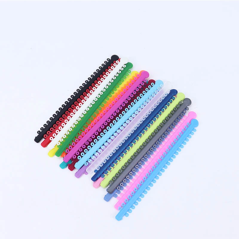 1000Ties/20 Sticks Dental Kieferorthopädische Elastische Ligatur Krawatten Mix Farben Bänder für Klammern Zahnspangen Kieferorthopädie Behandlung Image