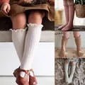 Calzini alti al ginocchio per bambini con volant neonate Toddlers calzini lunghi in cotone morbido fiore di pizzo calzini uniformi scolastiche per bambini per 0-8 anni