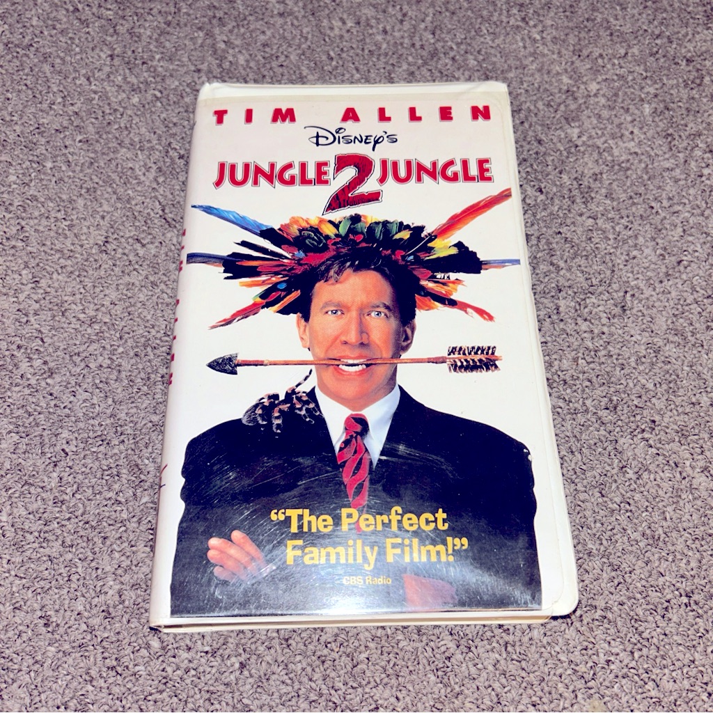 Disney Other | ~6/$10 Movies Vhs/Dvds~ Disney’s Jungle 2 Jungle Vhs In Clamshell 1997 | Color: Red/White | Size: Os