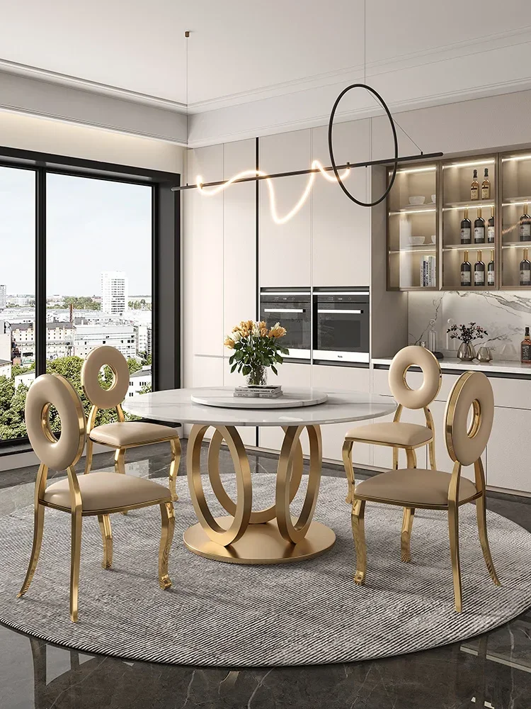 Luxuriöser postmoderner Esstisch aus Stein. Moderner, einfacher runder Tisch mit Drehteller aus Edelstahl