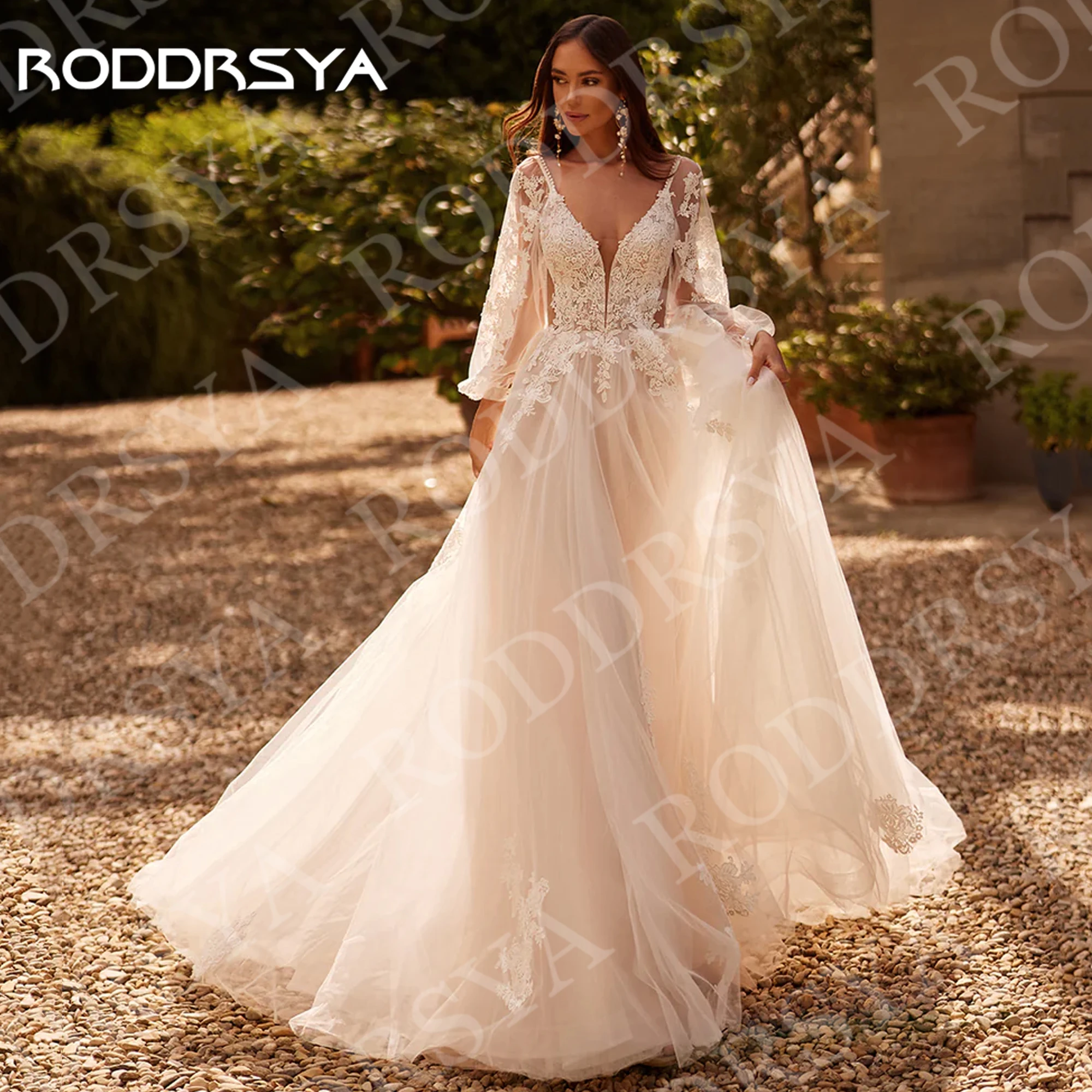 Roddrsya Boho Chic Brautkleider Bohemian tiefe V-Ausschnitt Spitze lange Ärmel Tüll Brautkleid rücken frei angepasst Boho Chic Brautkleider Bohemian Tief V-Ausschnitt Spitze Lange Ärmel Tüll Image