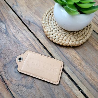 Coach Other | Coach Hang Tag Keychain Key Fob Bag Charm | Color: Cream/Tan | Size: Os
