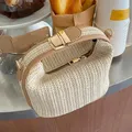 Borsa estiva piccola in paglia borsa a tracolla alla moda borsa a tracolla a secchiello intrecciata borsa da spiaggia Casual al mare borsa con manico dorato