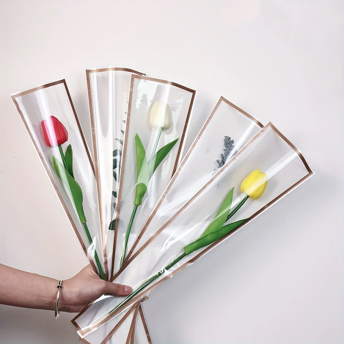 50/100 Stück Blumenpaket mit einzelnen Rosenhülsen, Blumenstraußpaket zum Valentinstag mit durchsichtiger Zellophan-Blumenverpackungsbeutel. Image