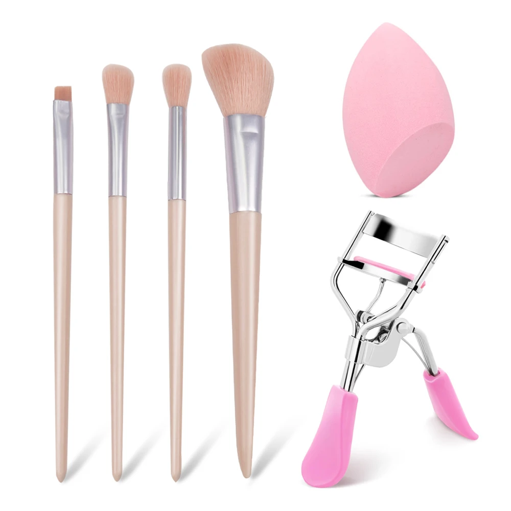 Ein 6-teiliges Make-up-Werkzeugset, einschließlich Wimpernzange, Schönheitseiern, tragbaren Make-up-Pinsel und ein kompletter Make-up-Look mit nur Image