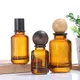 10 pz 30/50/100 ml Bottiglia di Profumo di Vetro Marrone Bottiglia Vuota Spray Con Tappo di Legno Crimp Nick Bottiglia di Profumo Bottiglia di Baionetta Atomizzatore