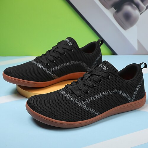 Weiße Strick-Sneaker für Herren mit leuchtend orangefarbener Sohle – atmungsaktive Freizeitschuhe zum Laufen, für Outdoor-Aktivitäten und den urbanen Style Image