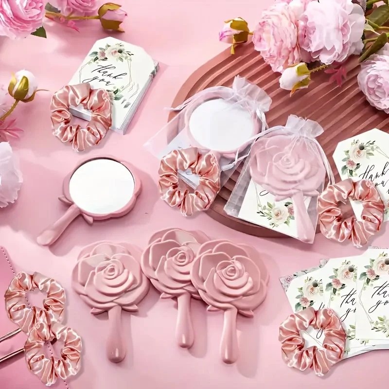 Das 20-teilige Hochzeitsgeschenkset mit Prinzessinnenmotiv enthält 5 Rosen-Make-up-Spiegeln, 5 Gazebeutel, 5 Dankeskarten und 5 Haarbänder Image
