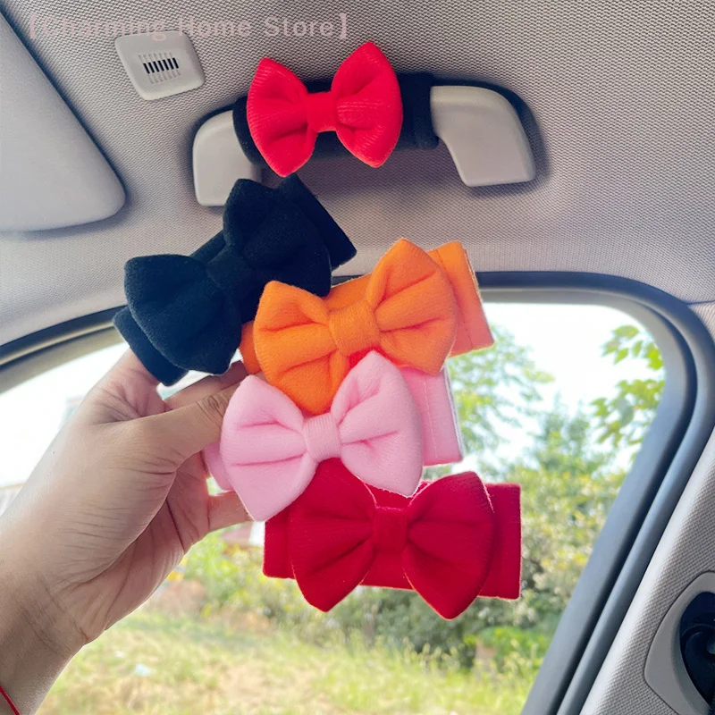 1 Stück Auto-Dachgriff-Abdeckung, weiche Wildleder-Schutzhülle, Auto-Dach-Armlehnen-Abdeckungen, niedliches Fliege-Zubehör für den Auto-Innenraum Image