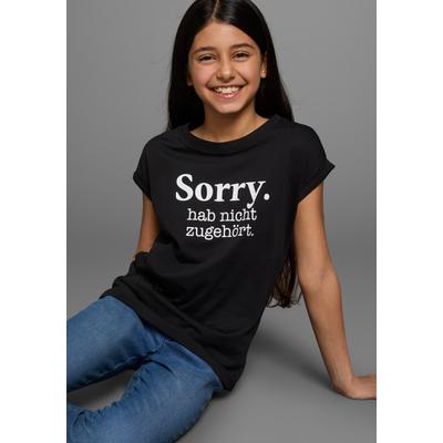 T-Shirt KIDSWORLD "Sorry. hab nicht zugehört.", Mädchen, Gr. 128/134, schwarz, Jersey, Obermaterial: 100% Baumwolle, bedruckt, modisch, weit hüftbedeckend, Rundhals, Kurzarm Aufschlag, Shirts, Kurzarm, bedruckt, Rundhalsausschnitt, aus Baumwolle Image