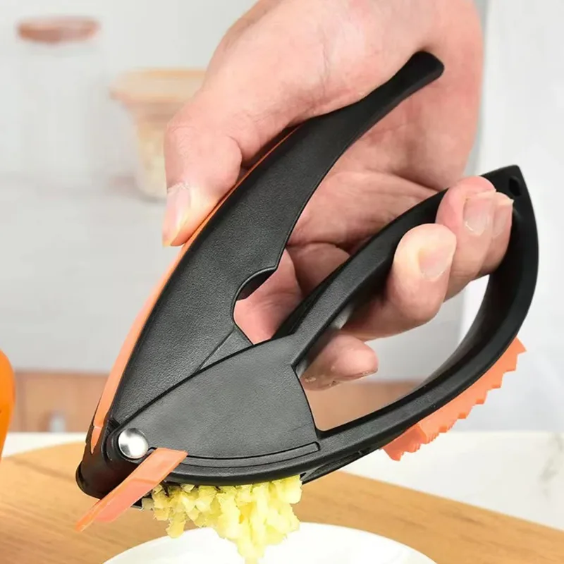 4-in-1-Knoblauchpresskühle aus Edelstahl geformt, manuelles Knoblauchmesser, Knoblauchmesser-Werkzeug, Obst- und Gemüsewerkzeuge, großer Füllstoff Image