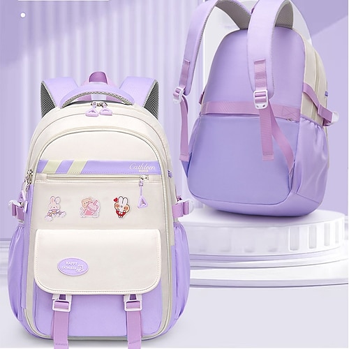 Zaino scolastico capiente per ragazze preadolescenti, leggero e multi-scomparto, con graziose spille, ideale per la scuola elementare e media, il ritorno a scuola, i viaggi e l'uso quotidiano.