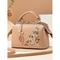 Damenhandtasche aus Kunstleder mit Blumenstickerei und Blattanhänger – elegante Umhängetasche mit Tragegriff für den Alltag, die Arbeit und Frühlingsausflüge