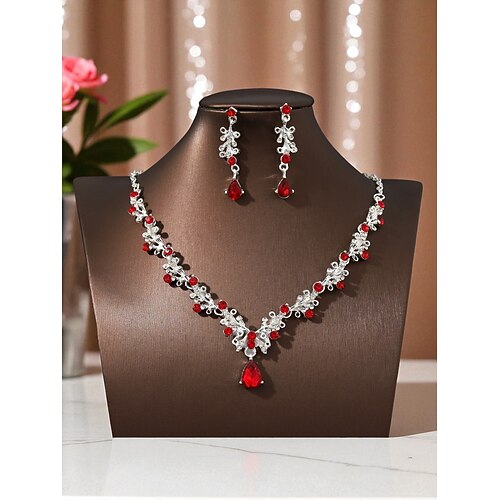 Elegantes vergoldetes Damen-Set aus Halskette und Ohrringen mit funkelnden Tropfenkristallen – Luxusschmuck für Hochzeiten, Partys und formelle Anlässe Image