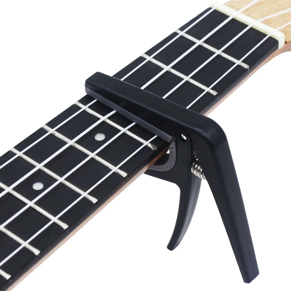 Gitarre Tuning Clamp Profi Schwarz Ukulele Capo Schnell Ändern Tuner Musical Instrument Zubehör Akustische 4 Saiten Hawaii Image